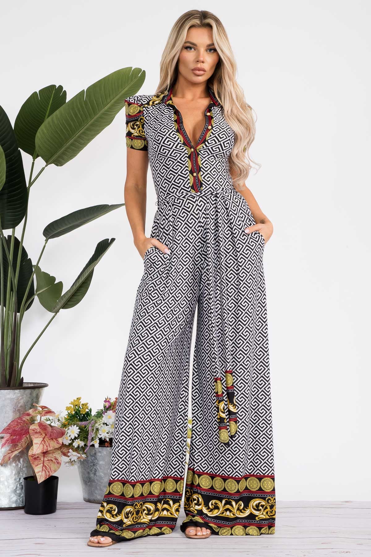 J1228 - FLARE PANT SLEEVELESS JUMPSUIT